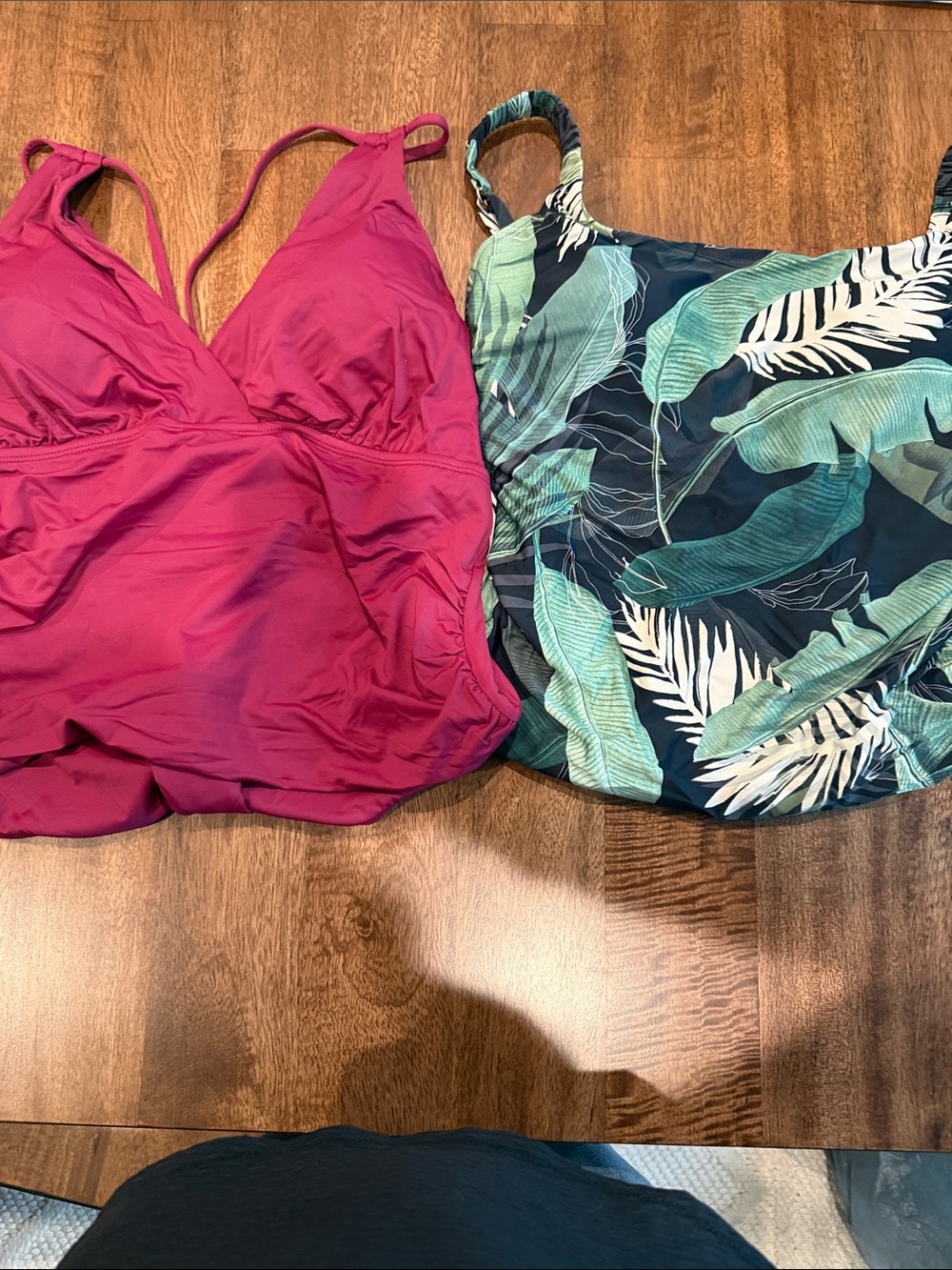Bundle- two swim suits one solid burgundy and one green and black leaf print